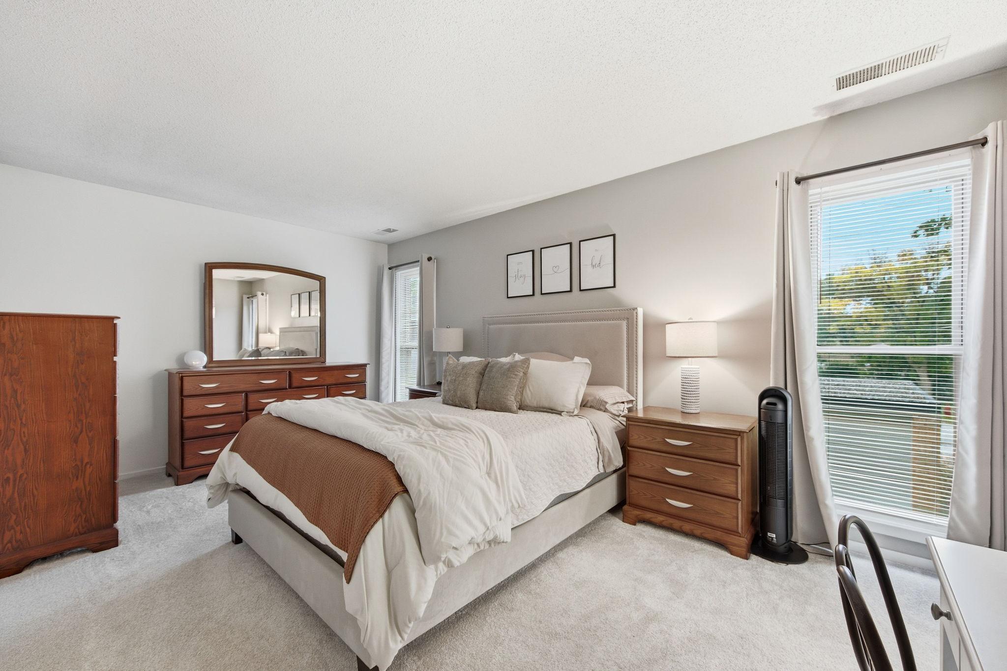 The spacious primary bedroom is such a bonus!