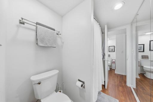 Two separate spaces in the bath are great for family or roommates.