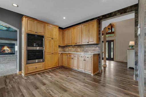 A seamless extension of the kitchen offering extra workspace and a dedicated setup for serving everyday needs and all the entertaining you can stand!