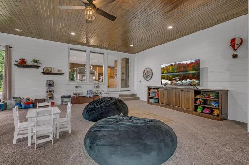 Enjoy This Beautiful Main Floor Sun Room For A Night Of Cards, TV!! Views Into The Kitchen/Dining Area!