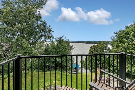Sit A Spell On This Amazing Upper Level Deck and Enjoy The Beautiful Views Of The Backyard And Deck!!