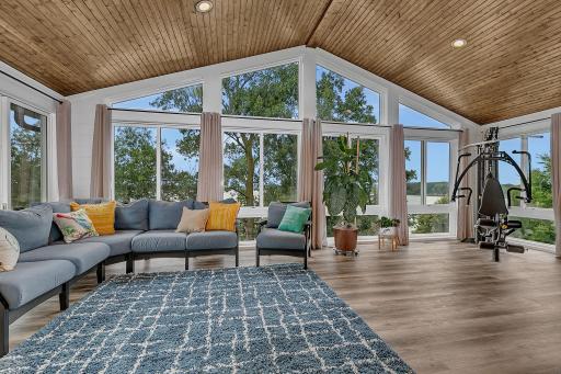 Perched high above the surrounding landscape, this expansive sanctuary creates a serene, "halfway to heaven" feel with instant WOW factor!