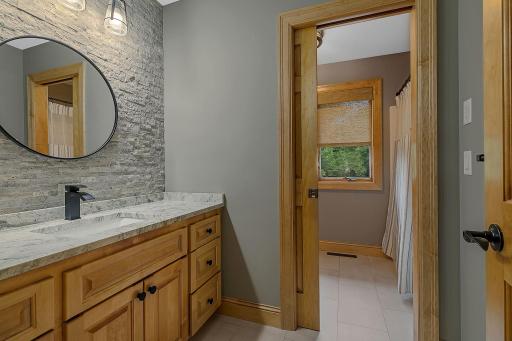 Primary Bath, Custom Stone And Views Into The Water Closet!