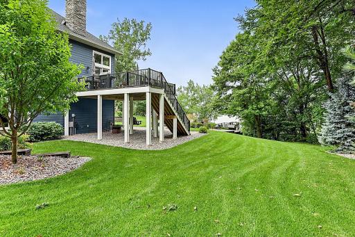 Step outside onto an expansive, maintenance-free deck designed for effortless outdoor living/entertaining. This Outdoor Retreat Flows Seamlessly Down To A Private Backyard, Featuring A Patio & An Inviting Fire Pit Area Perfect For Gathering!