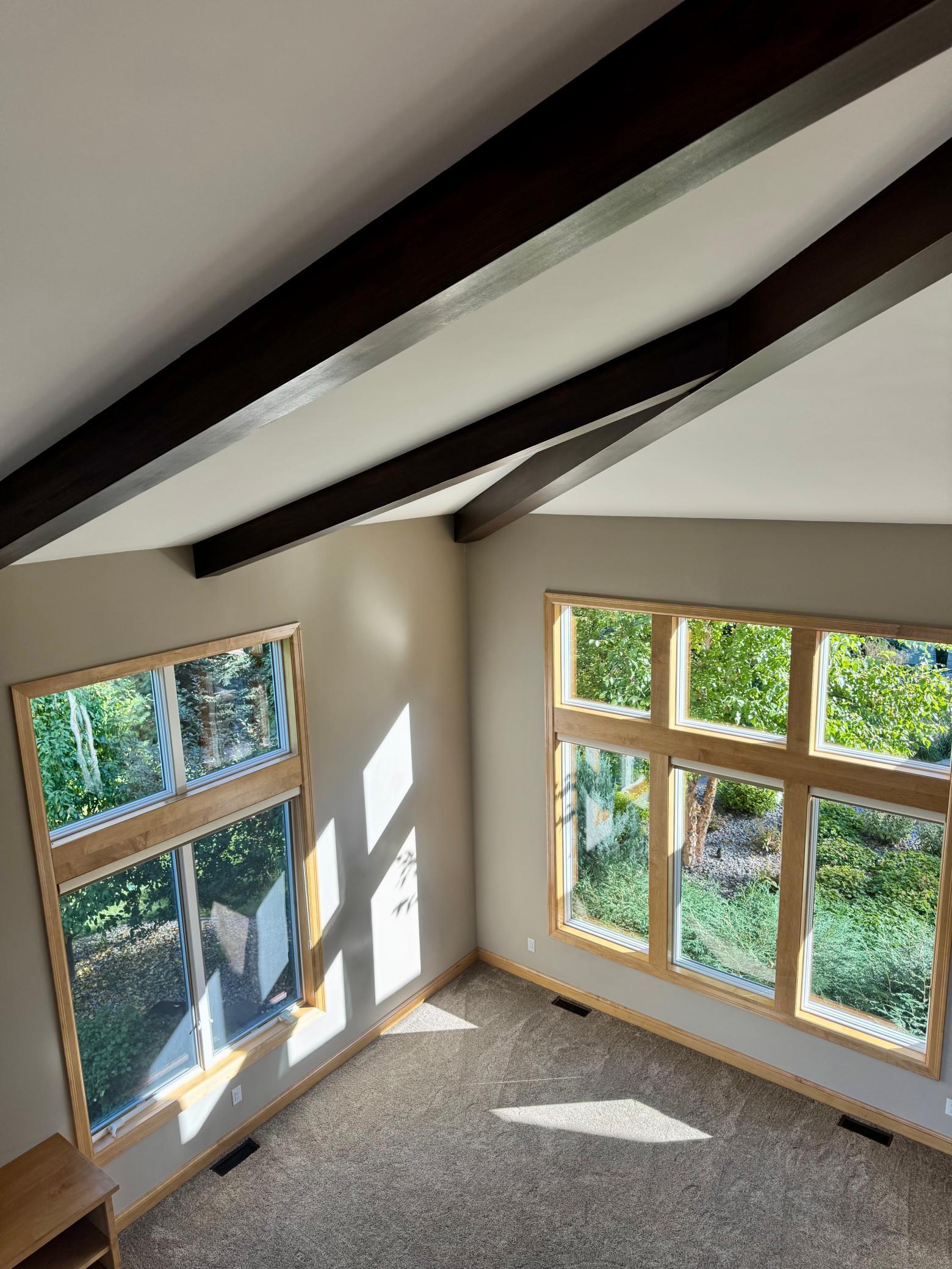 Soaring Ceilings With Handcrafted Beams Bringing In The Beautiful Morning Light In This Spacious, Beautiful Main Level Family Room!