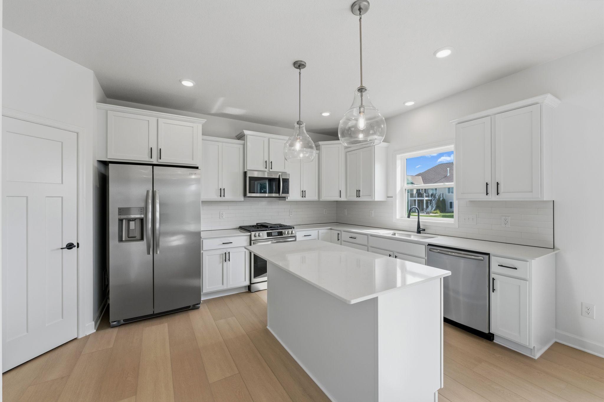 (All the following photos are of a similar home, actual finishes may vary.)