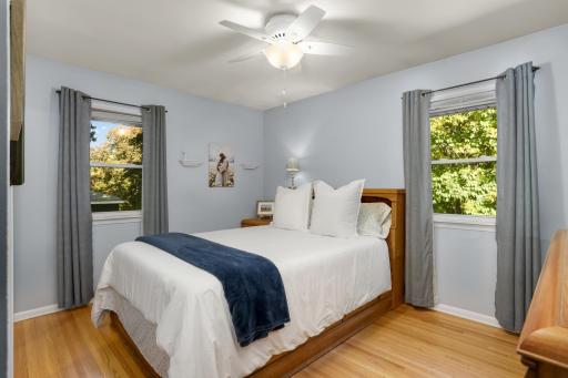 Primary bedroom on main floor offers spacious closet and newer windows