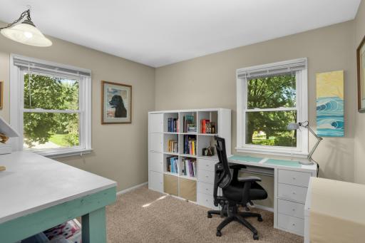 Second main floor bedroom currently used as sewing room/craft room