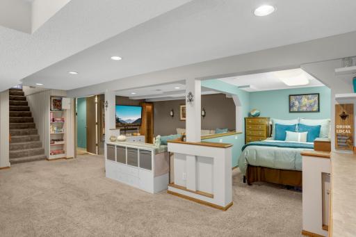 Open boxed in space for game table or currently used as a guest suite.