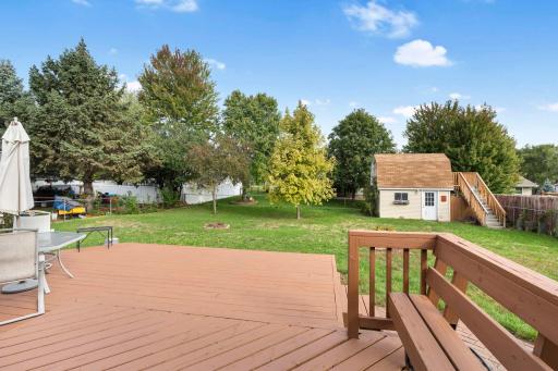 Oversized deck and fully fenced in backyard! Lots of room to run and play.