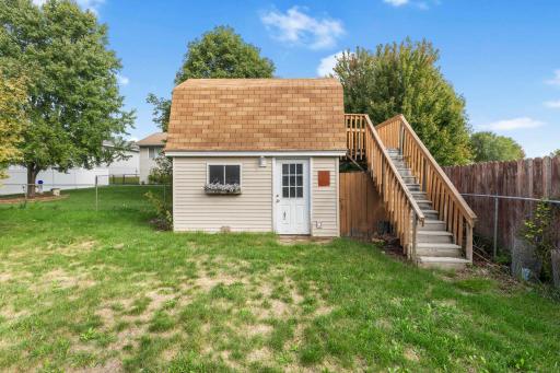 Fun and functional backyard shed offering plenty of extra storage, plus a unique upper-level deck to small loft âperfect for enjoying the outdoors and adding character to the backyard!