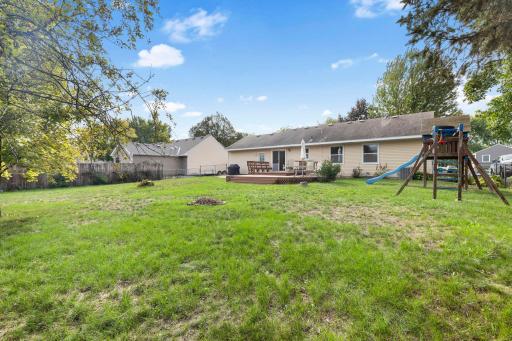 Spacious, tree-lined backyard offering plenty of room to play, garden, entertain, or simply relax outdoors. Enjoy the deck just off the homeâperfect for outdoor dining and gatherings.