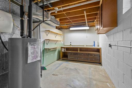 Spacious, unfinished storage room or workshop in the lower level.