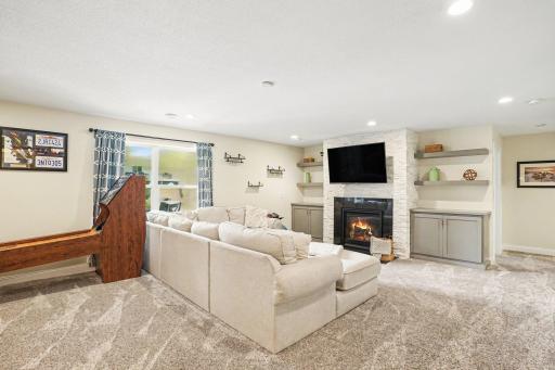 Gas fireplace and custom cabinets throughout