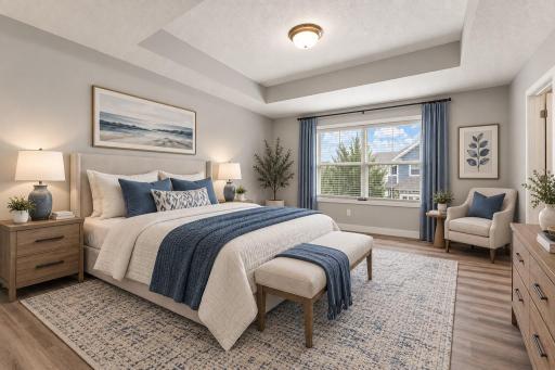 Staged Primary bedroom with great natural light