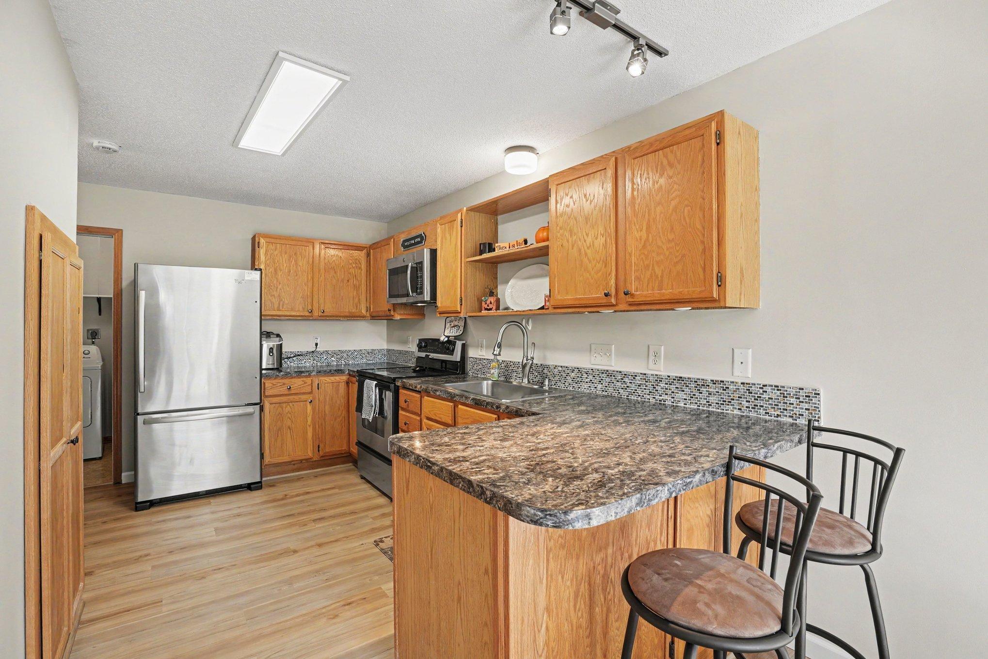LVP Flooring and Stainless Appliances