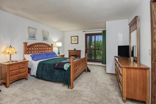 Large primary bedroom with private balcony.
