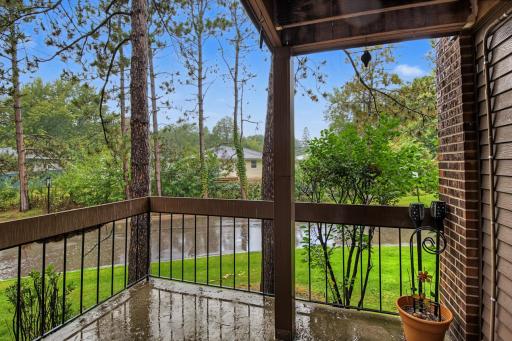 Located off the primary bedroom this is such an inviting balcony to enjoy.