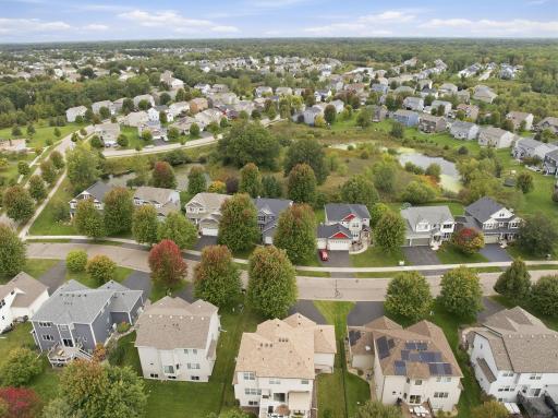 Enjoy an established neighborhood surrounded by mature trees, green space and scenic ponds. This elevated view highlights the beautiful natural setting woven throughout the community.