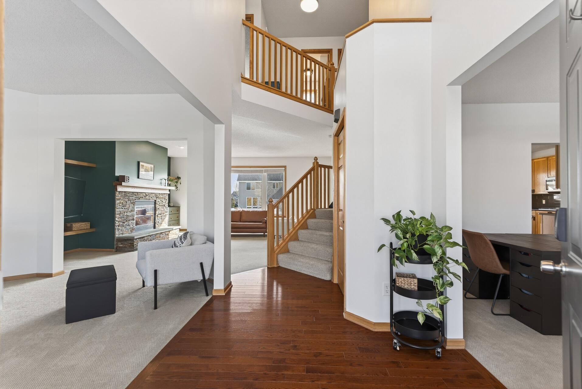 Two Story Foyer offers plenty of space to meet and greet company.