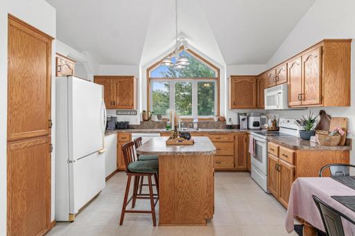 Tons of natural light floods through the gorgeous kitchen window