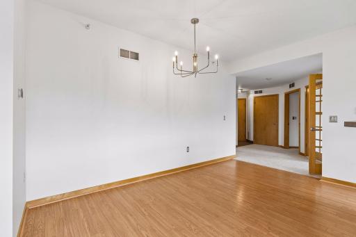 The informal dining area offers generous space for a table of any sizeâideal for hosting holiday gatherings or enjoying intimate dinners.