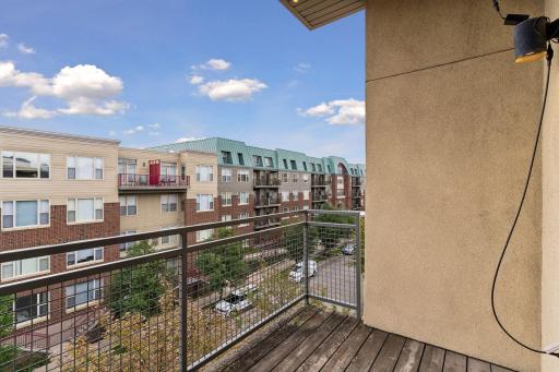 The den has its own covered balcony, with this view looking south.