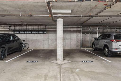 Two designated spots in the underground parking garage are included.
