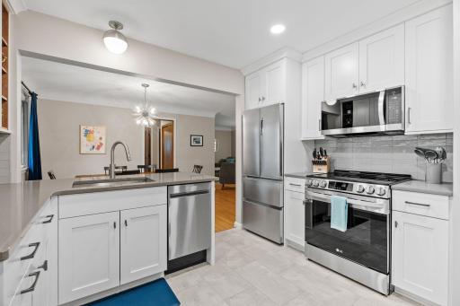 Enjoy your like new kitchen space! Stove and microwave.