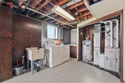 Laundry & utility space. New flooring in 2024