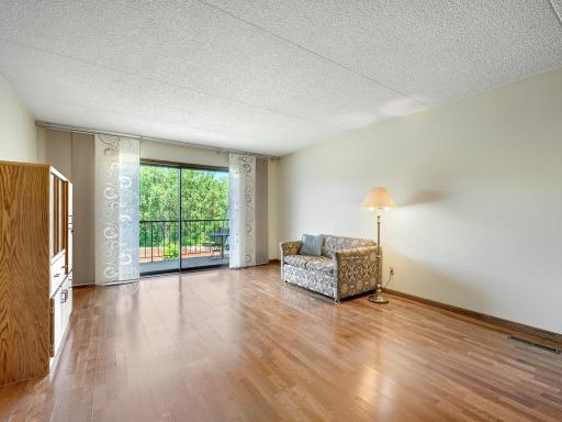 The living room leads to your private balcony which will be a lovely spot to sit with coffee in the morning.