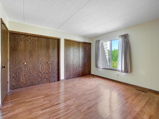 There is plenty of room for your king-size bedroom set here.