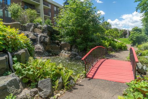 Be sure and walk the grounds when you come! They are stunning and have walking trails throughout. You will pass up this waterfall as you go.