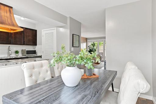The main level offers an effortless connection between living, dining, and outdoor spaces.