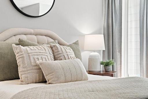 The second bedroom offers wonderful flexibility for guests, work-from-home space, or everyday living.