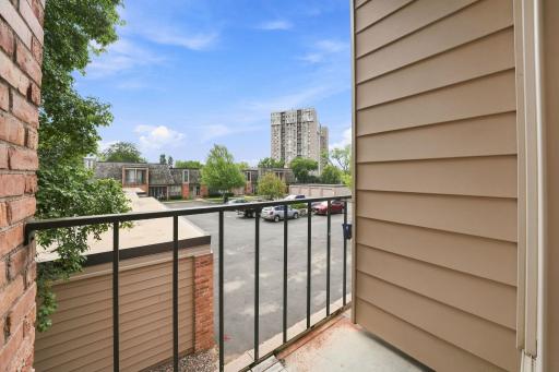 A private upper-level balcony adds another outdoor space to enjoy.
