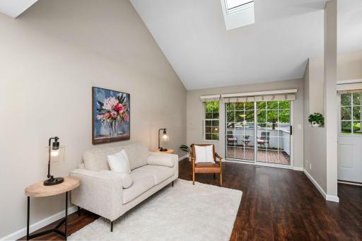 A convenient slider opens from the living room to a brick-paver patio with privacy fencing—bringing the outdoors right into your living space.