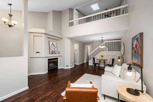 Cozy up by the gas fireplace and enjoy the warmth and comfort of this welcoming living space.