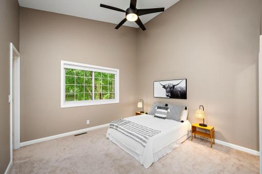 A bright and comfortable retreat with vaulted ceiling, peaceful views and room to unwind at the end of the day.