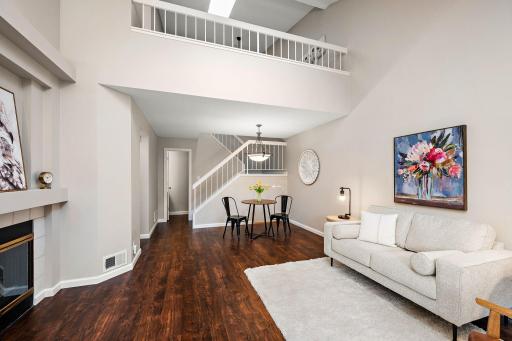 Open and inviting living and dining spaces flow beautifully together, making everyday living and entertaining feel effortless.