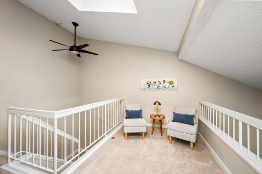 Bright loft with skylight makes an inviting home office or creative, versatile space with a great sense of openness.