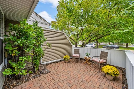 Your own private outdoor retreat! Spacious, brick-paver patio with privacy fencing offers a wonderful spot to relax, dine outdoors or enjoy a morning cup of coffee.