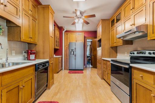 Cabinets to the ceiling provide ample storage.