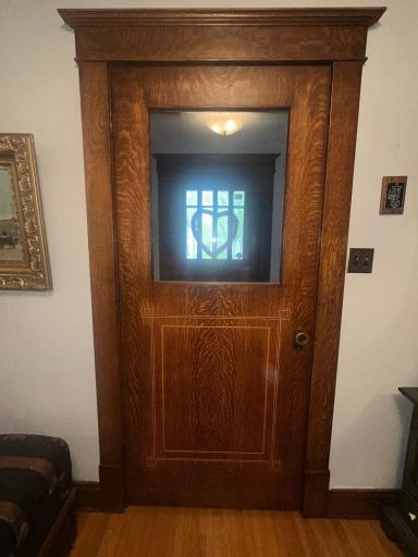 Front entry with detailed inlay and beveled window