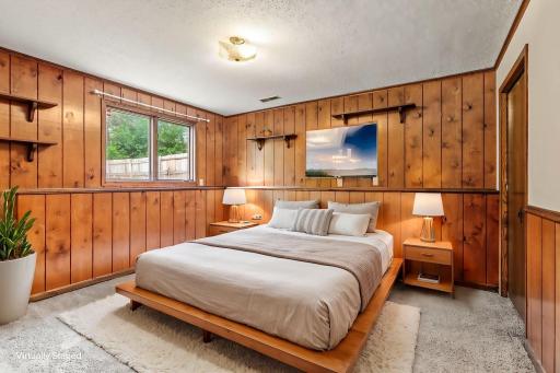 Garden level room virtually staged as a bedroom