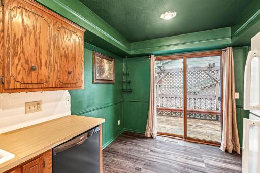 Deck with privacy wall right off the kitchen