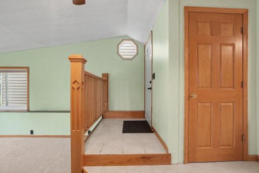 Walking in from the back door area. The other door is a big storage room!