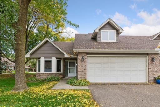 End-unit setting with an attached two-car garage and convenient main-level living.