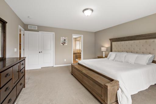 Primary bedroom boasts private 4 piece bath and huge walk in closet.