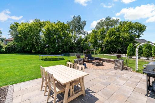 Stunning patio and firepit area is a MUST SEE!